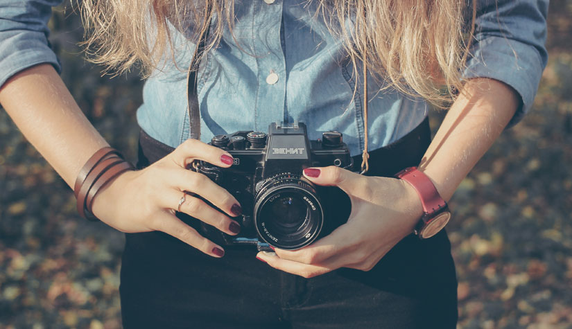 How do you focus a camera?